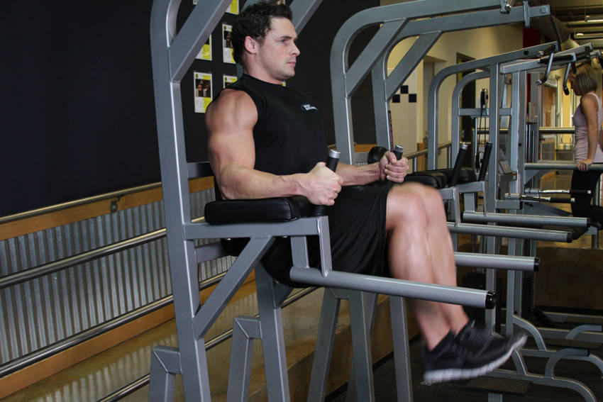Knee/Hip Raise On Parallel Bars, end position