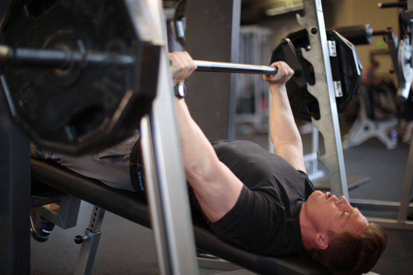 Smith Machine Decline Press, end position