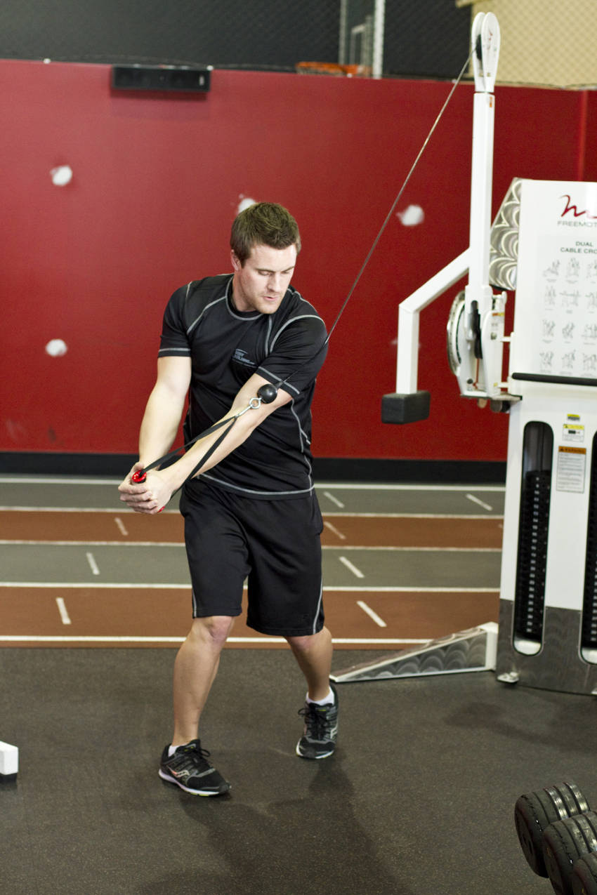 Standing Cable Wood Chop, end position