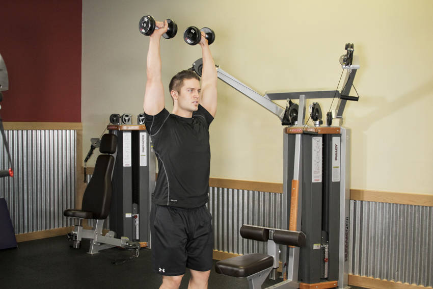 Standing Dumbbell Press, end position