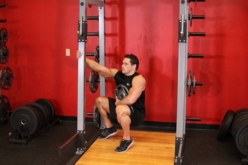 Weighted Sissy Squat, end position